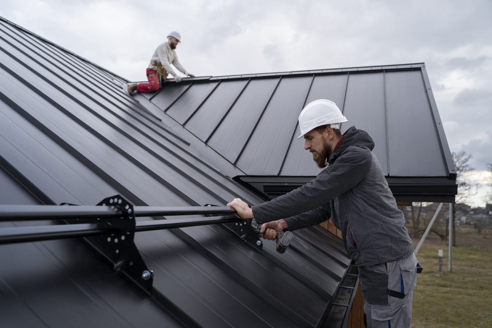 Roofers working on a residential roof